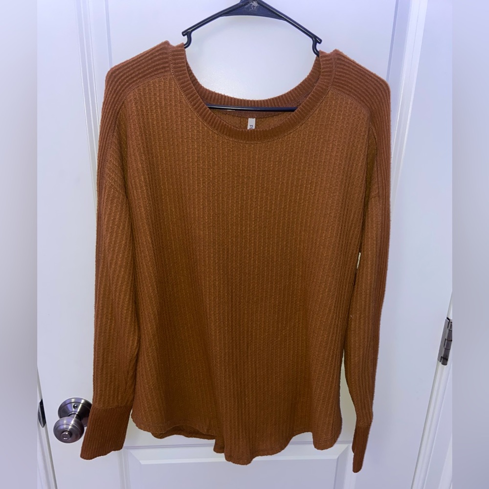 large orange sweater